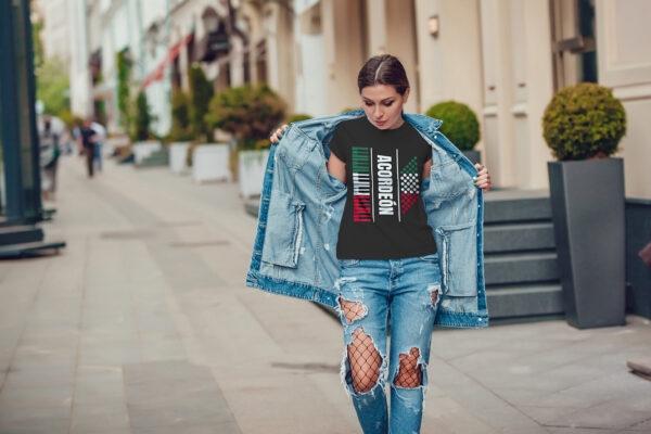 Attractive girl in a jeans jacket and white t-shirt walking along the street. Mock-up. FIESTAS PATRIAS